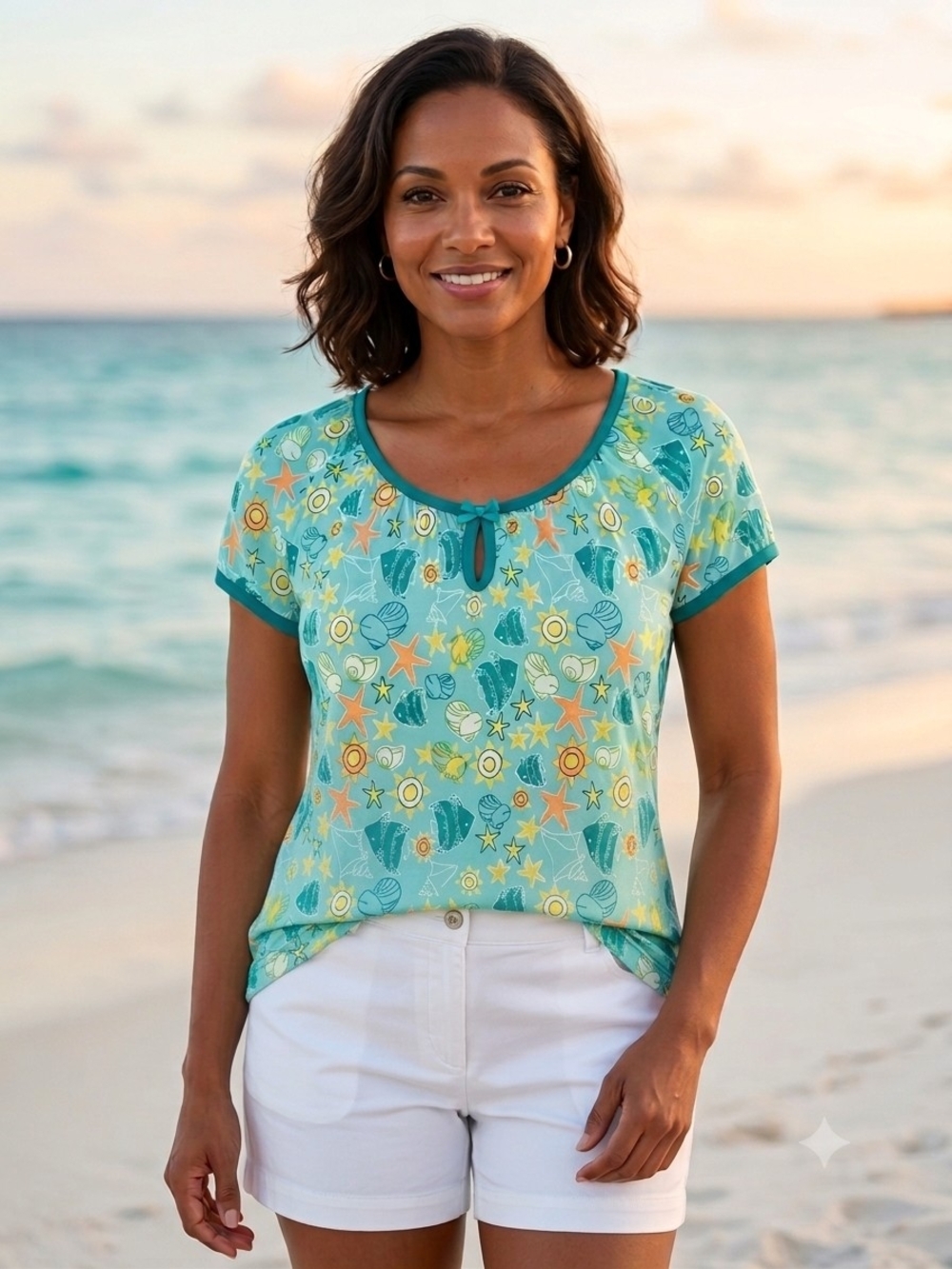 Coastal Breezes Seafoam Keyhole Short Sleeve Tee with Shell Print.      WS 194